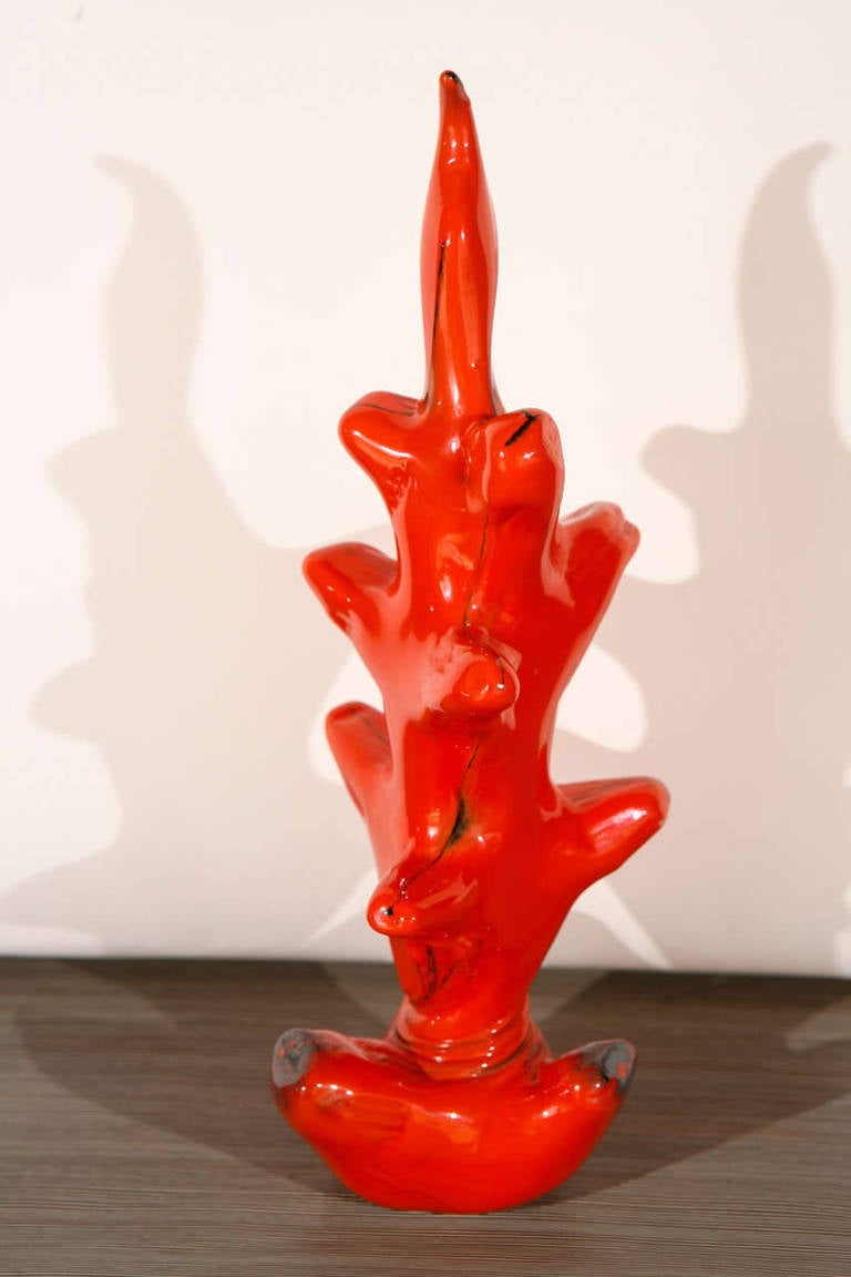 Modern, unique Murano sculpture. Prototype for a Dolce and Gabbana perfume bottle. This is one piece in a dark flaming orange. Signed, edition seven of seven.
