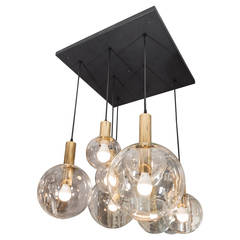 Custom 8 globe Brass and Black chandelier