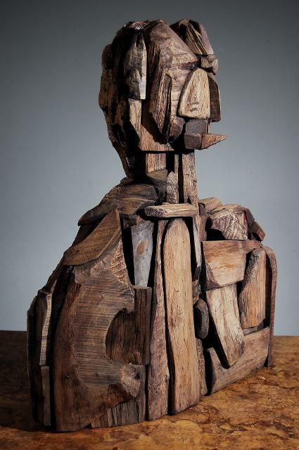 An Unsual Continental Wooden Bust of a Man