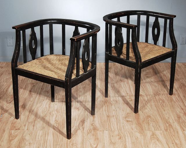 Each of barrel back form, with alternating pierced back splats and plain back splats, the woven cord seats raised on square tapering legs.