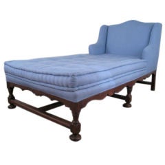 Antique A Large Louis XIV Style Walnut and Oak Chaise Lounge