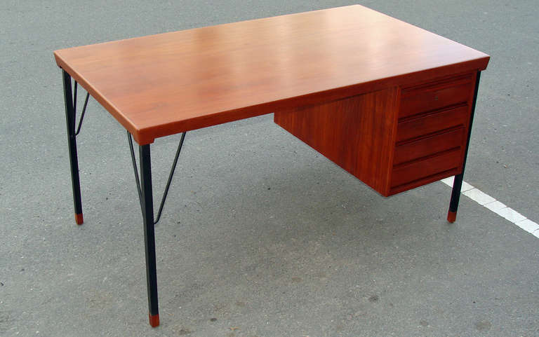 Superb teak and steel single pedestal desk.designed by Peter Hvidt and Orla Molgaard-Nielsen.. for Soborg Mobelfabrik.

Four drawers and pull-out slide.  Reverse side has open compartment with adjustable glass shelf.  Newly refinished.

This
