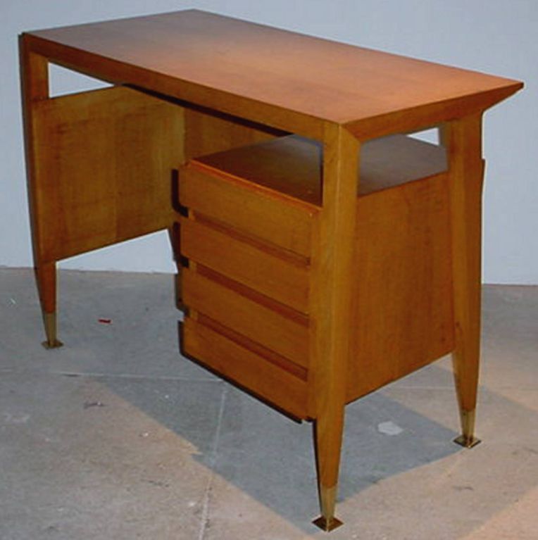 Wonderful Ponti discovery...diminuitive desk/writing table from the Vembi-Burroughs office, Genoa and Turin.  Four drawers.<br />
Note kneehole opening is 20" wide.