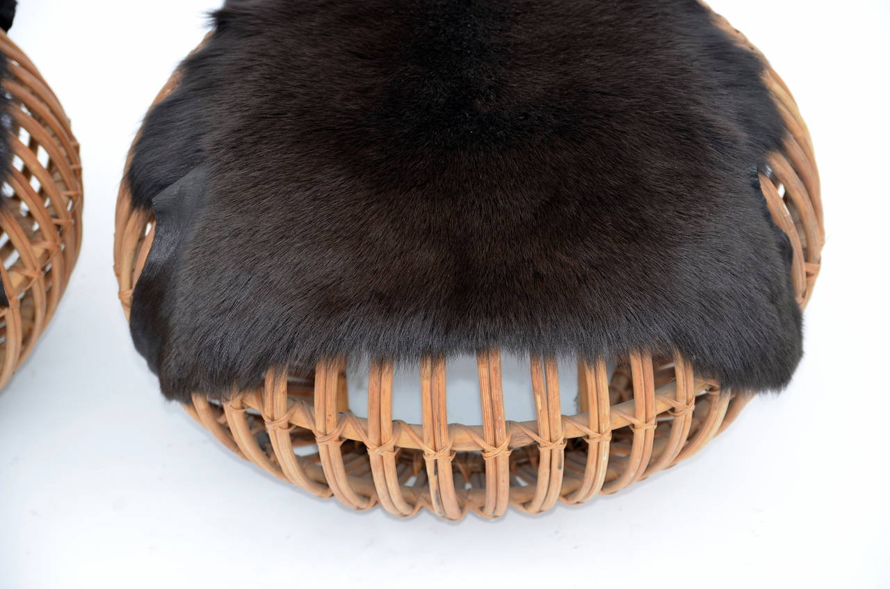 20th Century Pair of Round Rattan Ottomans in the Style of Franco Albini with Fur Covers