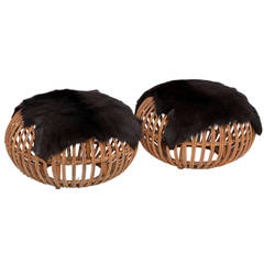 Pair of Round Rattan Ottomans in the Style of Franco Albini with Fur Covers