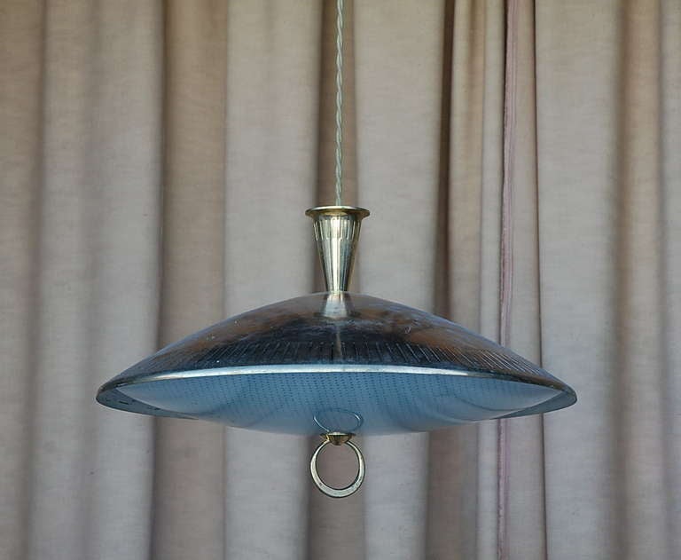 Chic brass and textured glass pendant light. Matching canopy. Extra long cord to adjust drop.