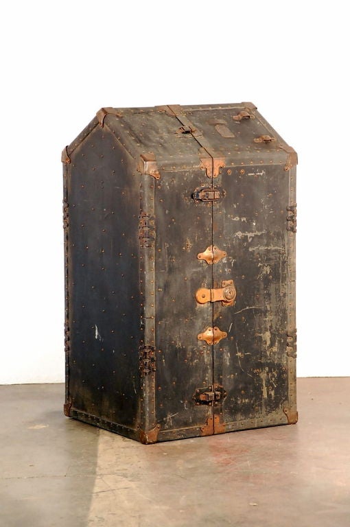Weathered steamer trunk. Great for decoration or for a guest bedroom.
