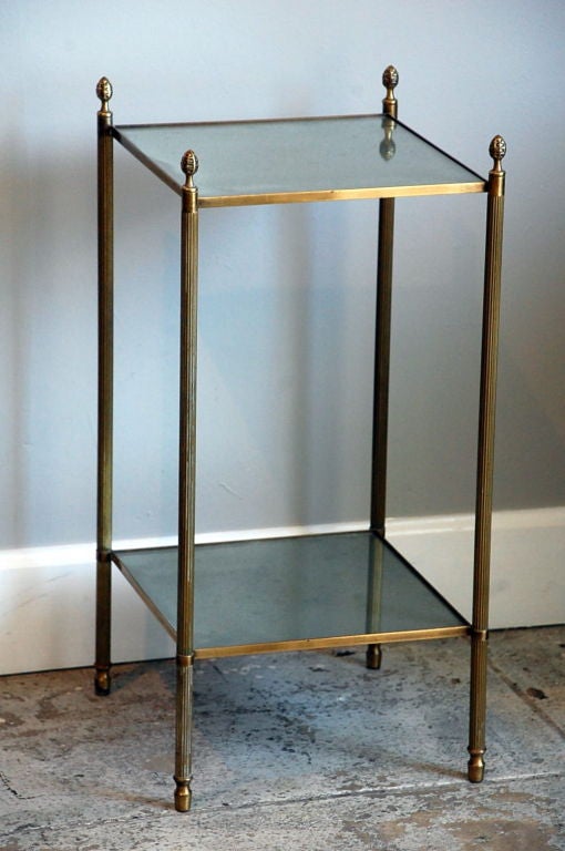 Classic French gilt bronze two-tier side table by Maison Baguès. The best quality work. Antiqued mirror shelves.
