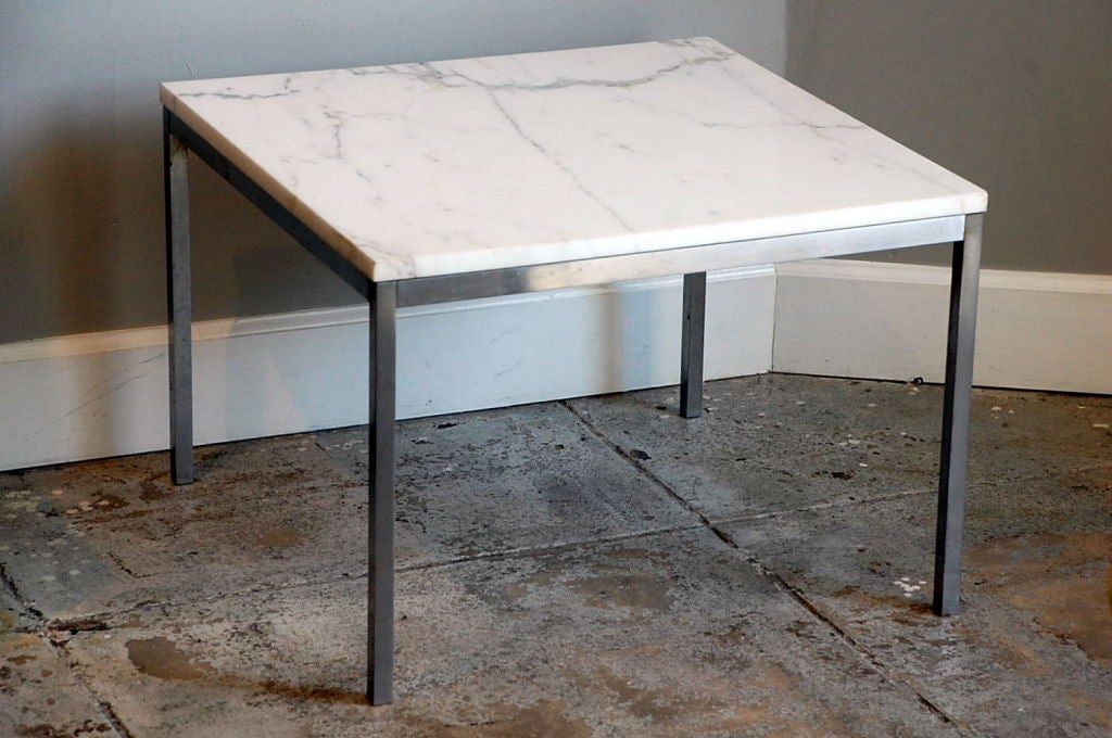 Original marble and steel end/coffee table by Florence Knoll for Knoll.

Florence Knoll coffee and end tables, designed to furnish the new interiors of postwar America, are scaled-down translations of the lines, gestures and materials of modern