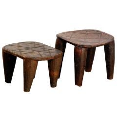 Two primitive African carved wood stools / side tables