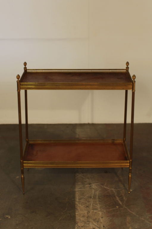 Chic French 40's two tier brass and leather side table