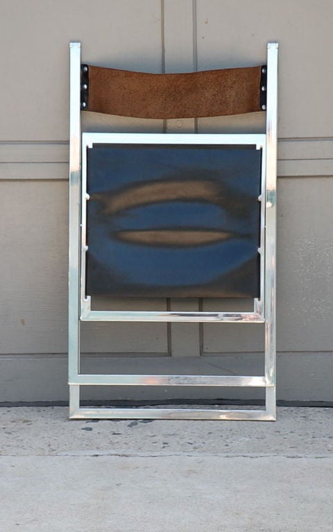 Minimalistic chrome and leather folding chair edited by Lübke 1