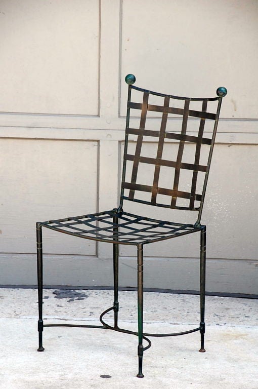patinated wrought iron side chair by Salterini. 17 in. seat height.