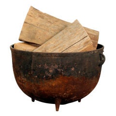 Vintage Industrial cauldron chimney wood holder