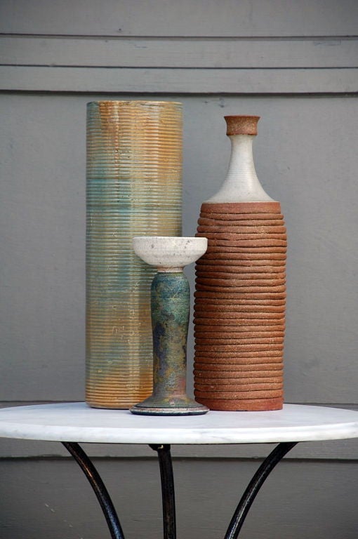 Collection of 3 decorative studio ceramics. Sold together as a set. Largest is 18 in. tall x 6 in. diameter.
