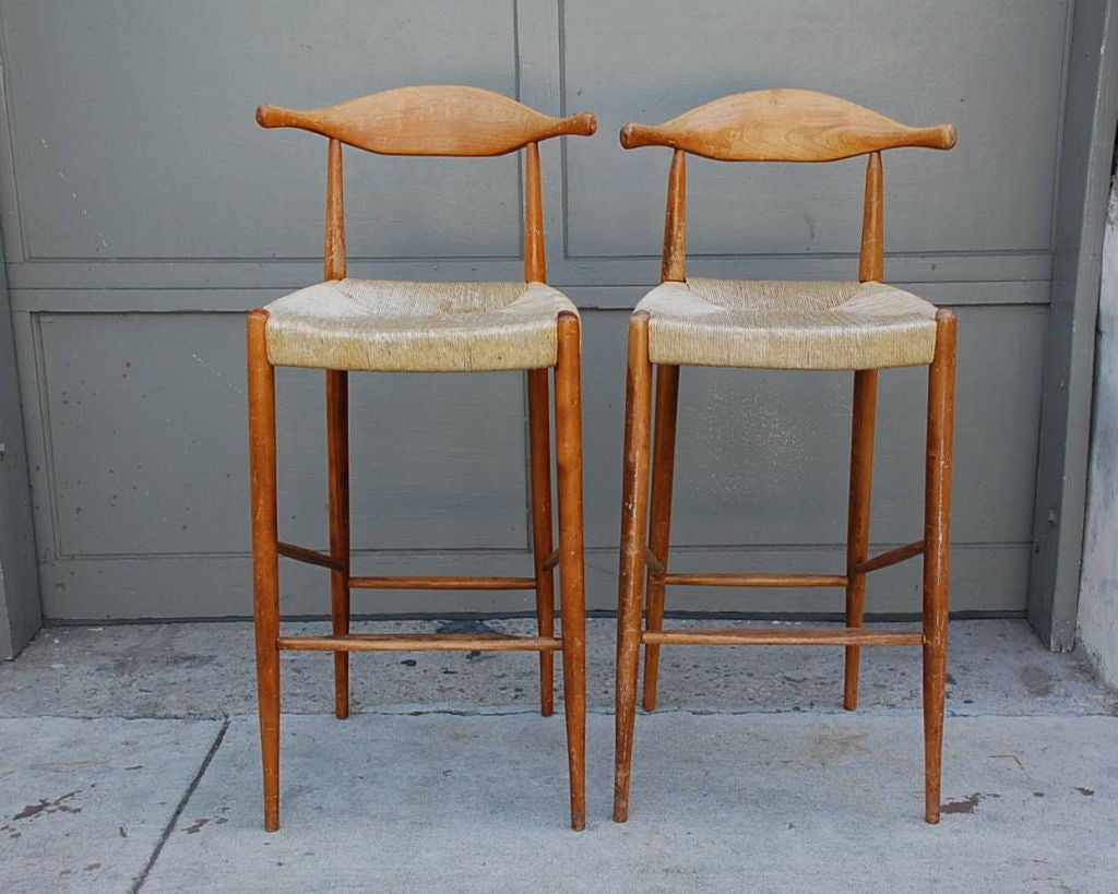 Pair of tall wishbone bar stools. 28 in. seat height.