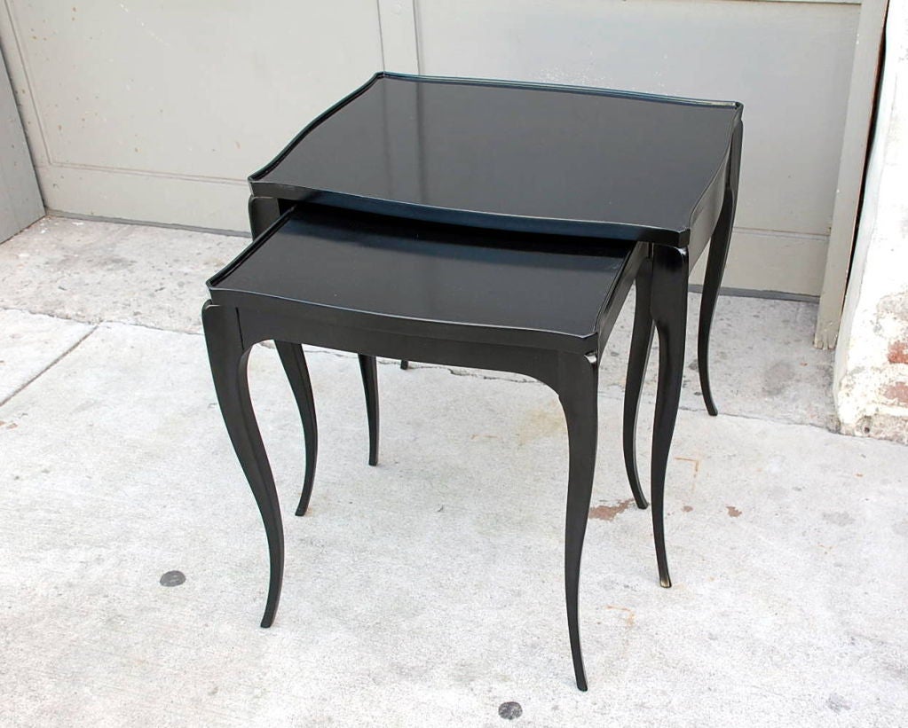 Set of elegant black lacquer nesting tables at 1stdibs