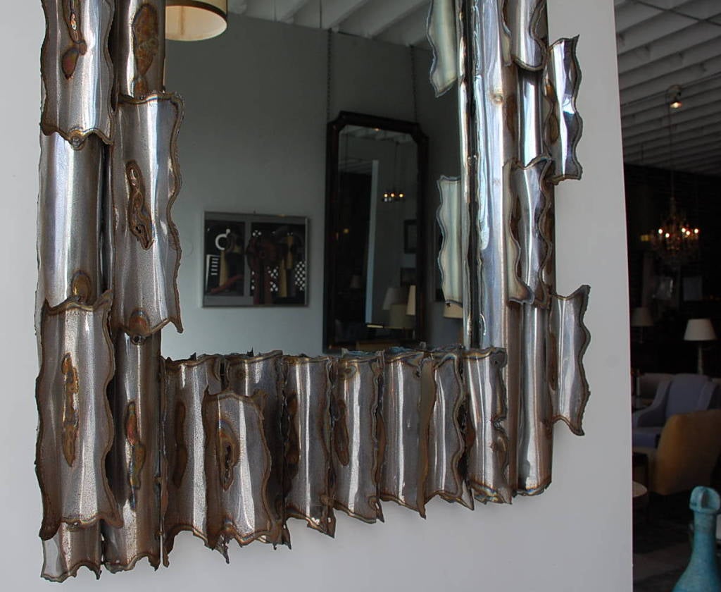 Exceptional American brutalist mirror. Signed and dated 1978.