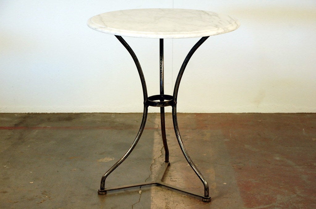 Polished French industrial cafe table with marble top