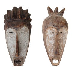 Pair of Decorative Weathered Ngil Style Gabonese African Masks