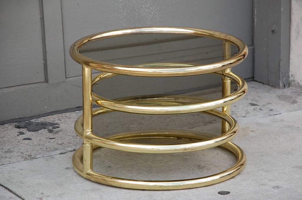 American Extendable brass and smoked glass coffee table