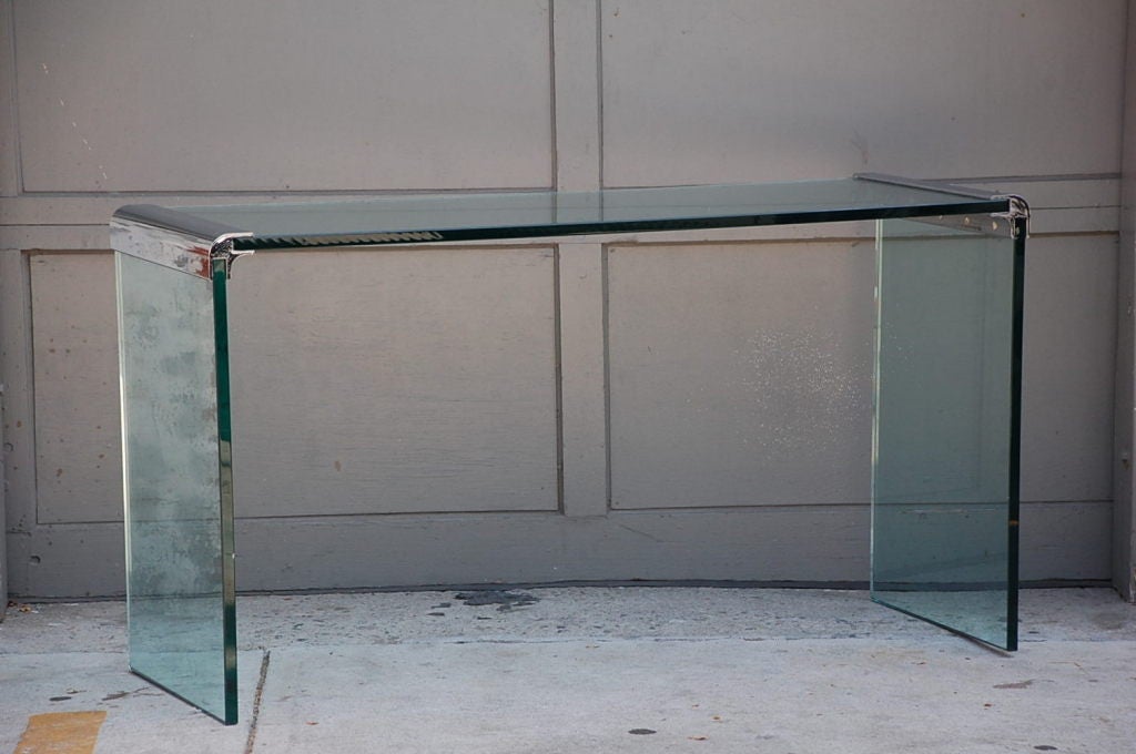 Thick glass and chromed bronze console by Pace.