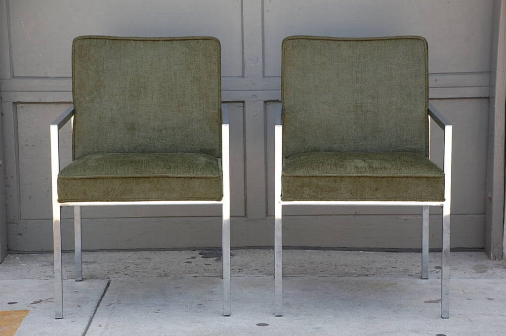Pair of chic chromed steel upholstered armchairs. Heavy. Very comfortable. 19 in. seat height; 24.5 in. seat height.