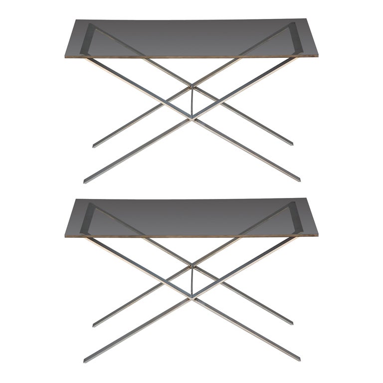 Pair of minimalistic stainless steel and glass side tables For Sale