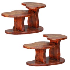 Pair of two tier kidney shaped knotted Oregon pine side tables
