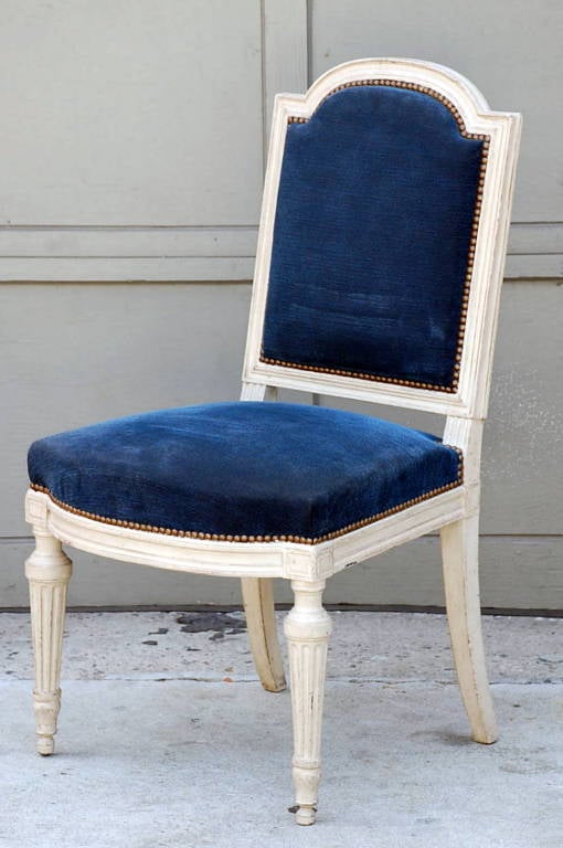 Large Louis XVI style blue velvet chair. Very good quality craftsmanship. Very large and comfortable.