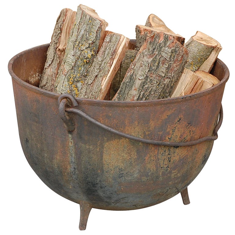 Patinated iron cauldron / firewood holder