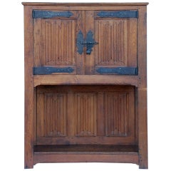 French Renaissance style carved oak and wrought iron cabinet