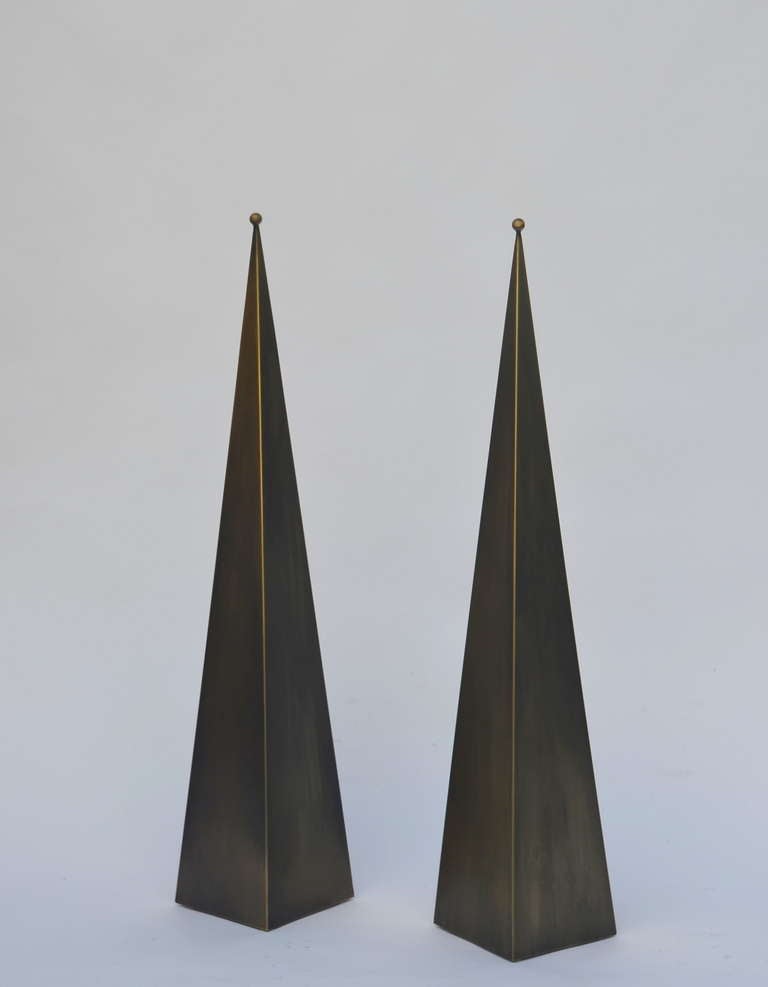 Pair of large patinated brass console / floor lamps in the style of Mathieu Matégot.