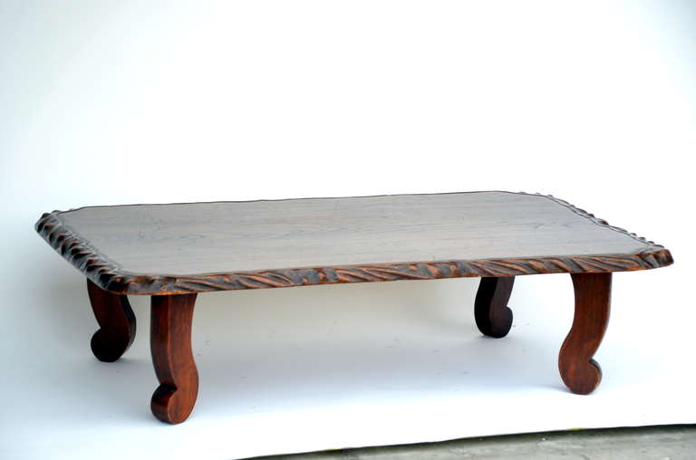 Large low Japanese keyaki wood coffee table. Made from one large wood slap, carved around the edges.