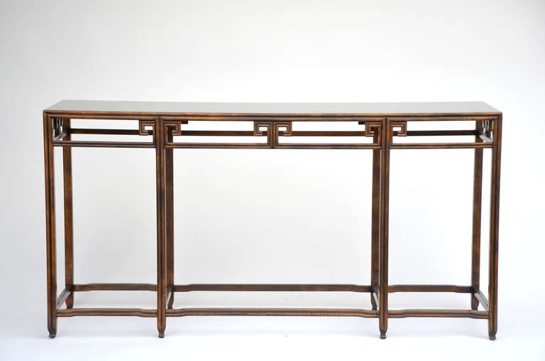 Elegant Asian-inspired slender console / sofa table by Baker.