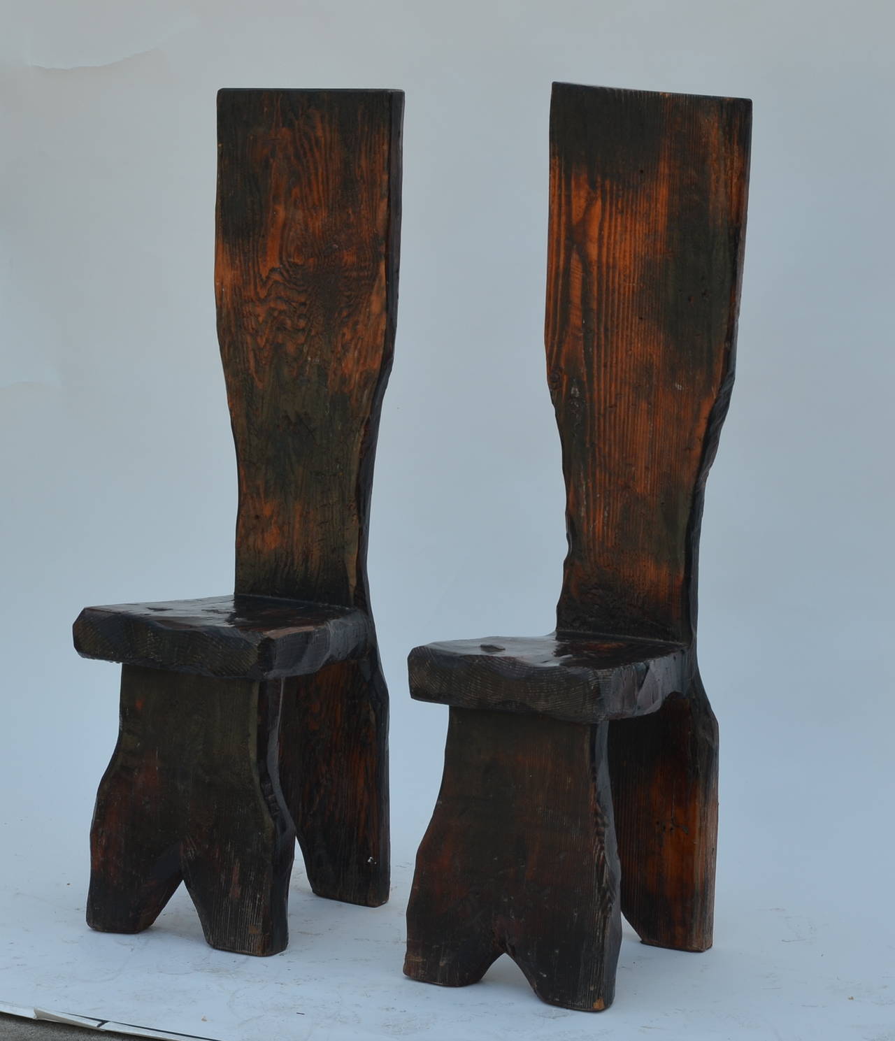 Unique pair of sculptural Oregon pine wabi side chairs. Primitive wabi-sabi look and feel, a philosophy that embraces quietude and modesty.
