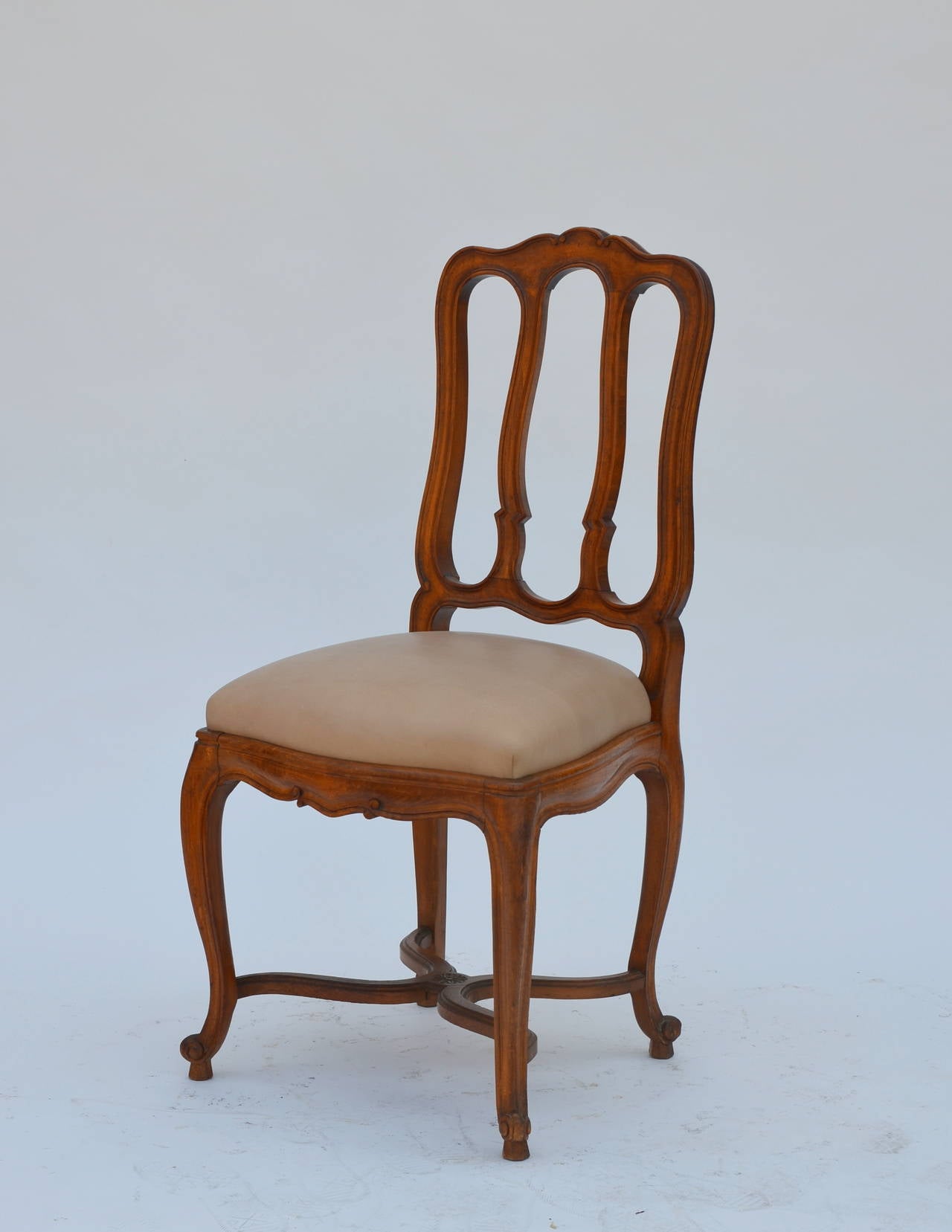 Carved Impressive Set of 12 Chic French Louis XV Style Dining Chairs and Armchairs