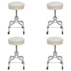 Set of Four Vintage Chrome and White Leather Adjustable Rolling Stools 9