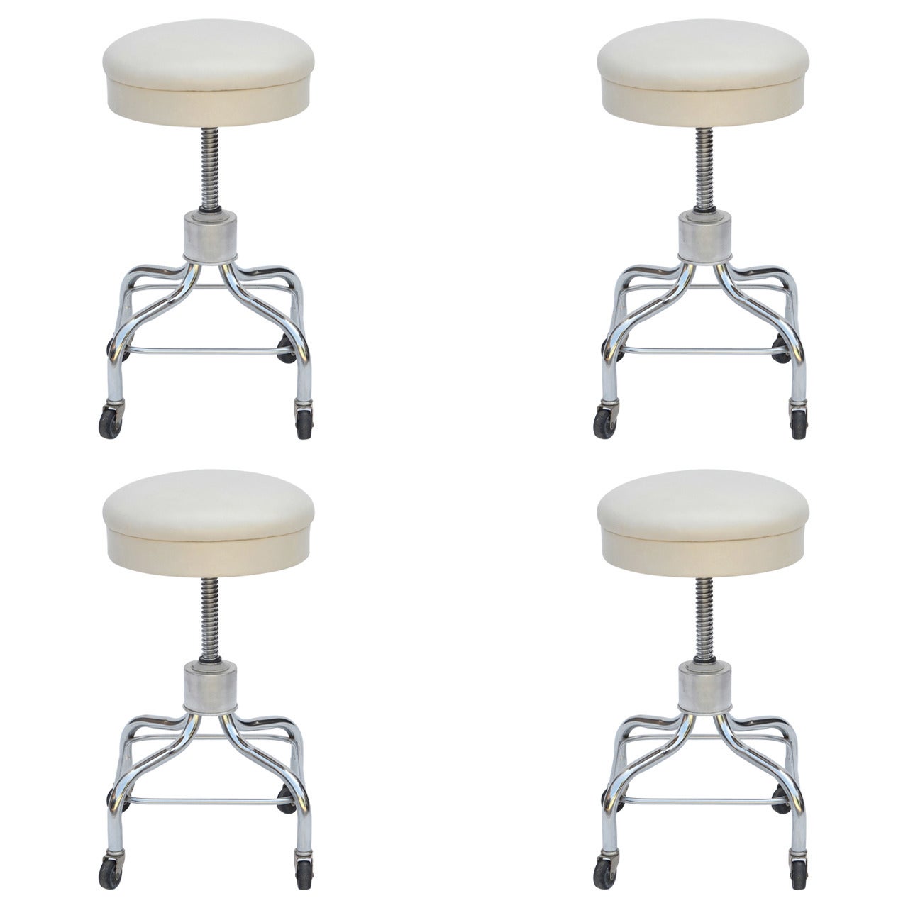 Set of Four Vintage Chrome and White Leather Adjustable Rolling Stools
