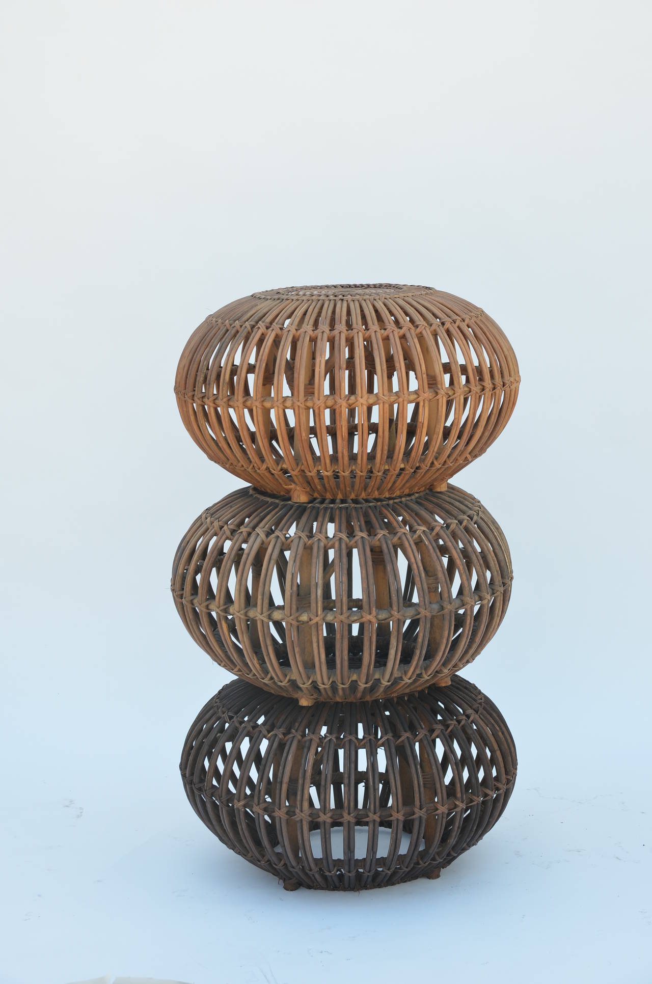 Set of 3 rattan ottomans or stools in the style of Franco Albini In Good Condition In Los Angeles, CA