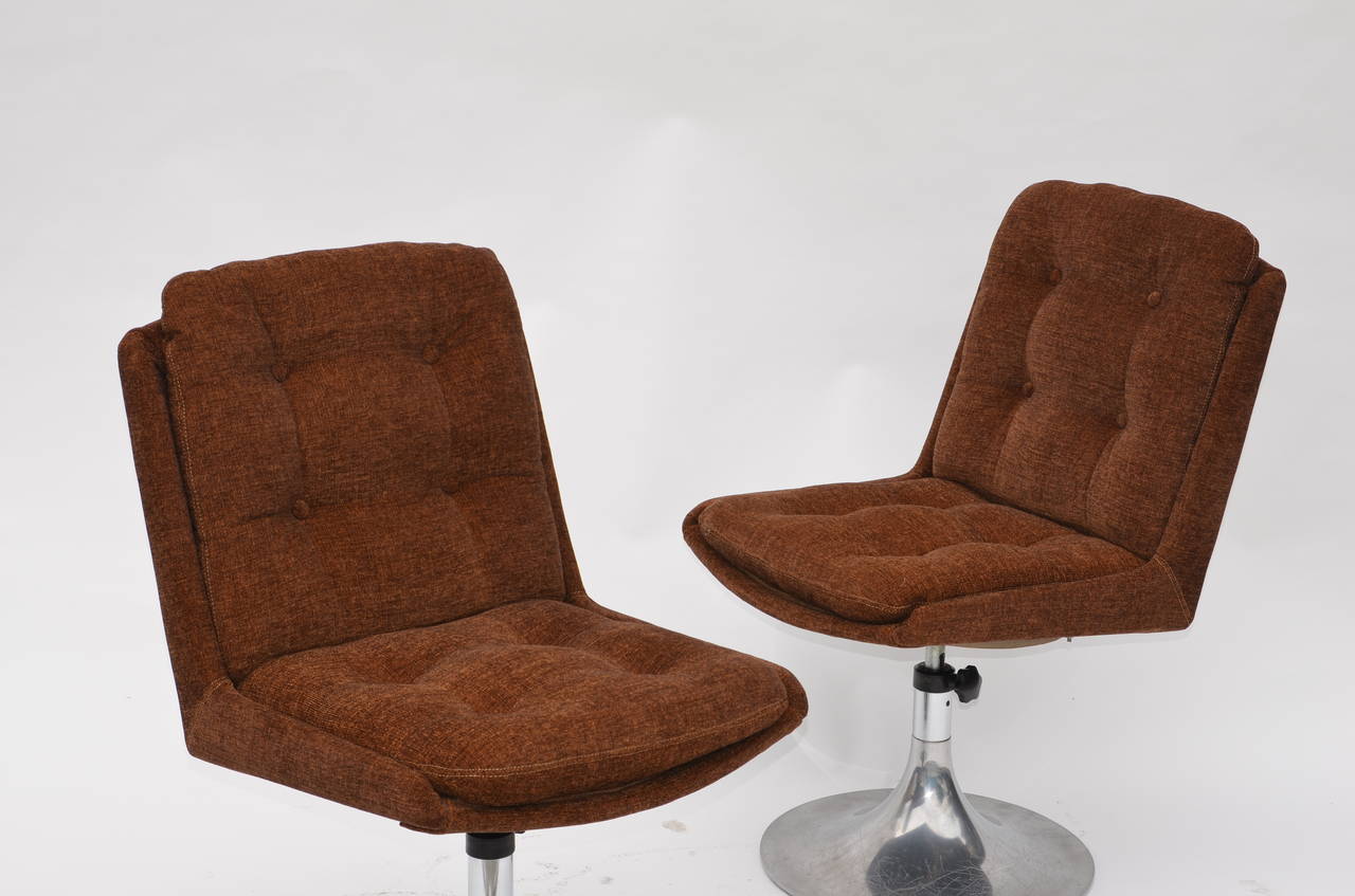 Pair of unusual French 1960s pedestal chairs in the style of Roger Tallon. Restored and reupholstered.