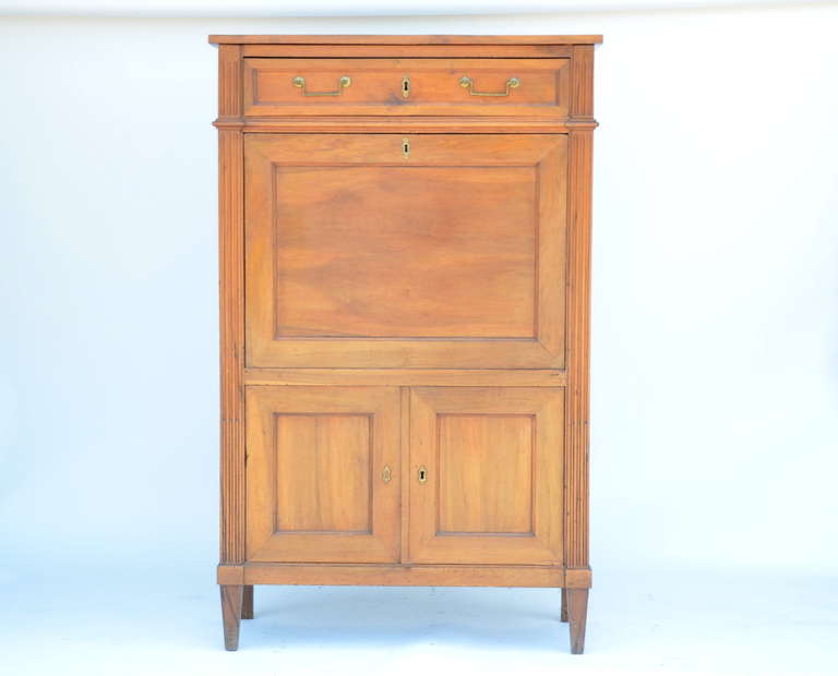 Elegant Louis XVI cherrywood secrétaire cabinet.