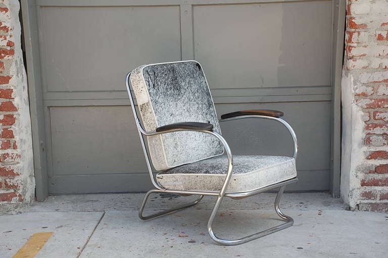 Chrome Armchair in Grey Hide in the style of Kem Weber.