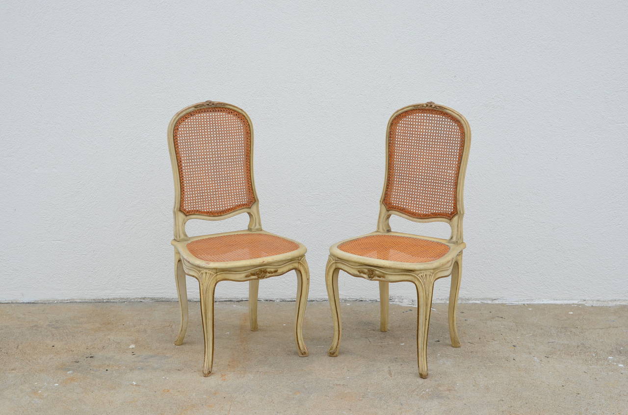 Set of four Louis XV Style Caned Chairs. Sold as a set of four or by the pair.