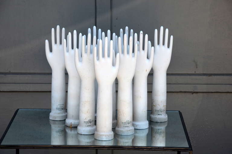 Collection of 10 vintage porcelain glove molds. Sold as a set only.