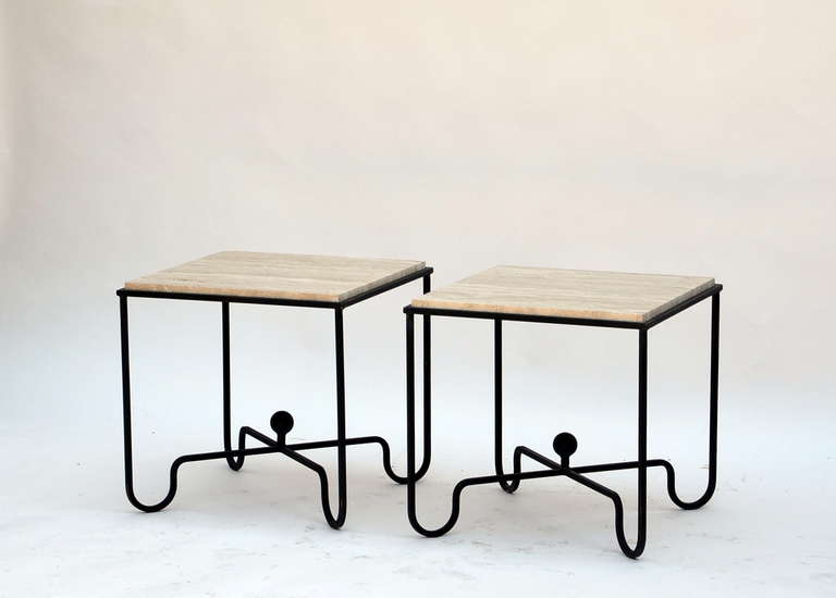 Pair of wrought iron and travertine side tables the style of Mathieu Matégot. Can also be used as a 2 part coffee table.