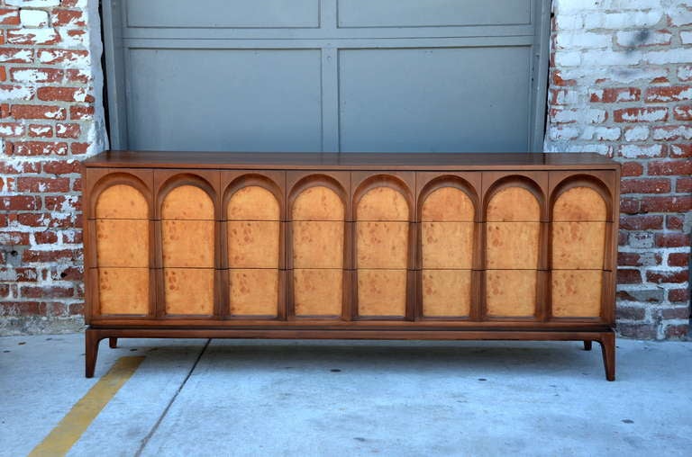 Sculptural burlwood and walnut sideboard by Thomasville. Stamped Thomasville. Nice contrast between the burlwood panels and the walnut arches.