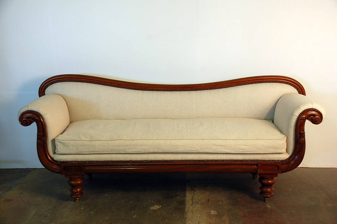 Sculptural Victorian Settee / banquette. Restored and reupholstered in quality toile bisonne. Removable seat cushion.. Great in a hallway or in a bedroom (thin, flat back).