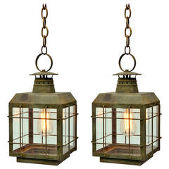 Pair of Patinated Bronze and Glass Handing Lanterns