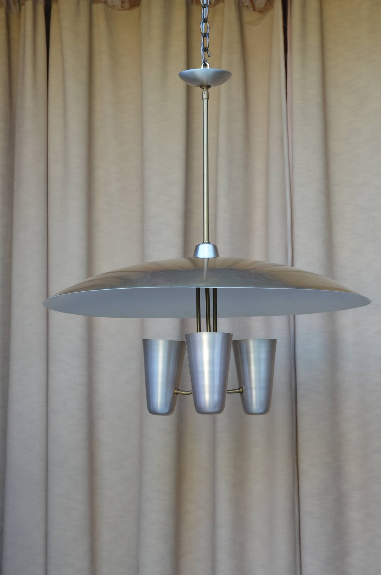 Spectacular Gerald Thurston indirect light ceiling fixture for Lightolier. Unusually large and in excellent condition for a vintage piece. Rewired with original stem and canopy.